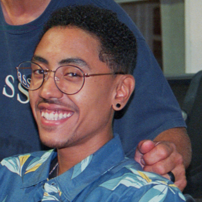 a photo of writer Steven Nieves smiling at the camera